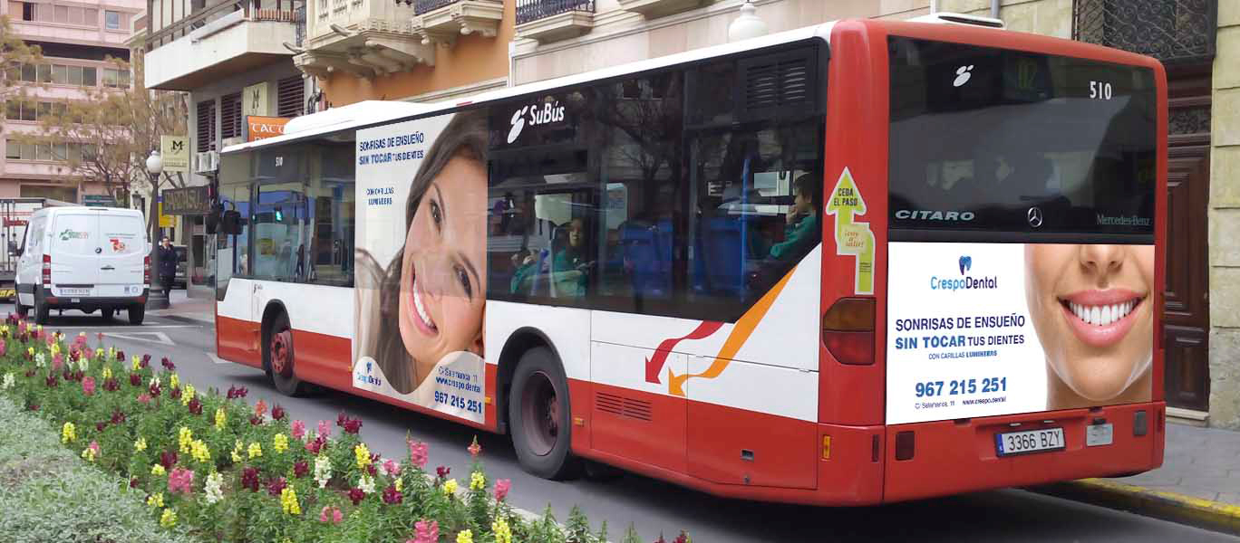 Diseño gráfico Albacete, diseño de vinilos autobuses, diseño publicidad autobuses Albacete Crespo Dental